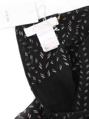 Jupe taille haute patineuse en soie noir imprimé marron Prix boutique 1200€ Taille 34 — photo 2