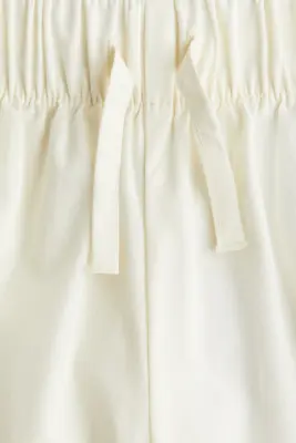 Pantalon court avec broderie anglaise - Crème — photo 2