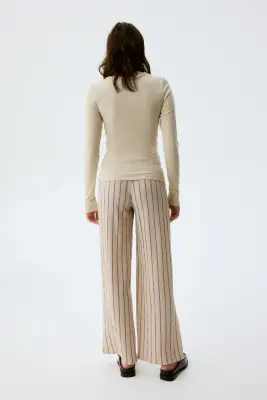 MAMA Pantalon large - Beige clair/rayé — photo 1