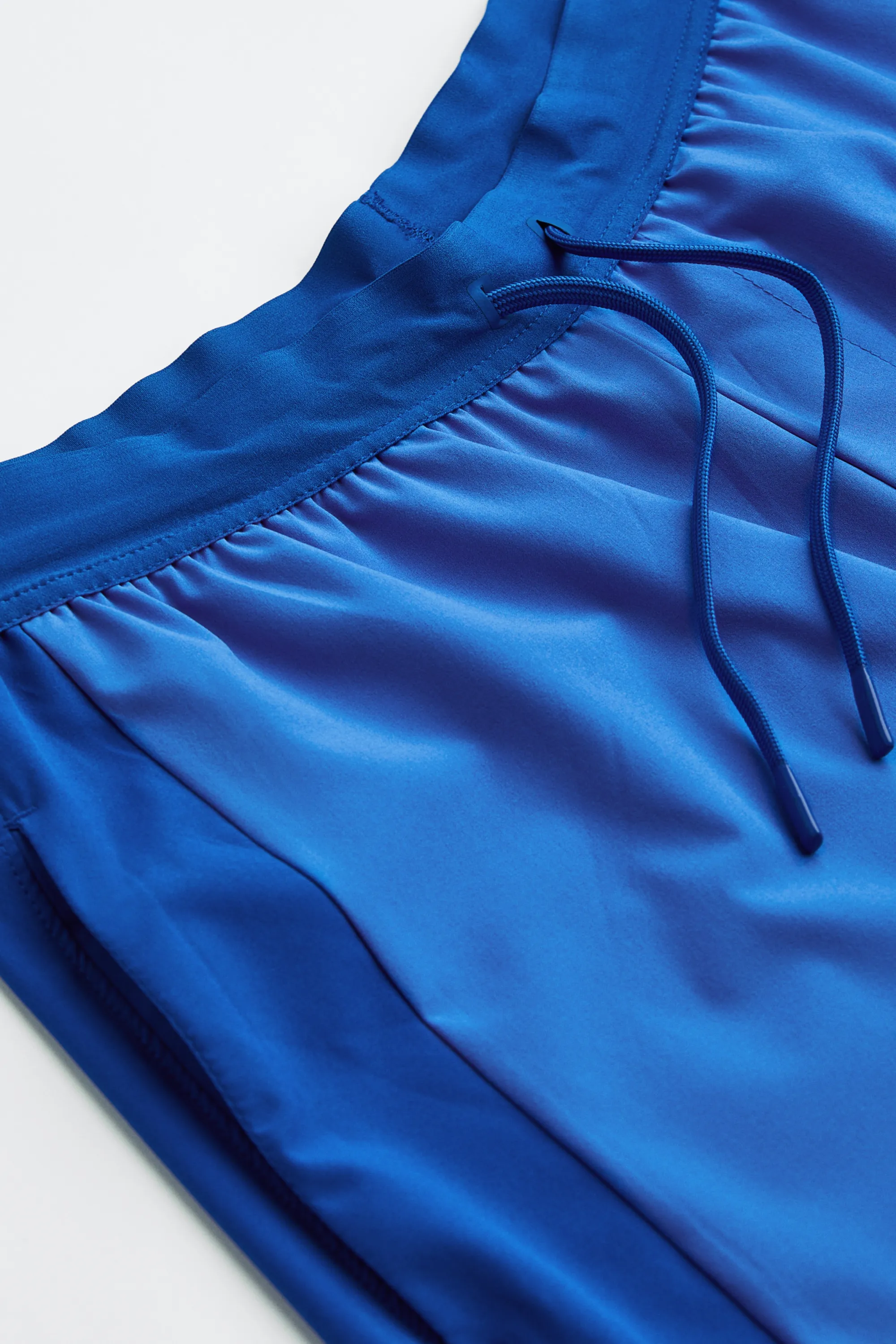 Short de sport court en textile DryMove™ - Bleu