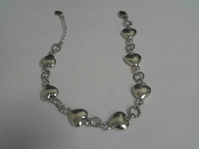 Bracelet coeurs neuf