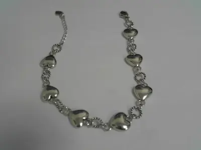 Bracelet coeurs neuf