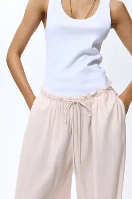 Pantalon à cordon avec jambes ballon - Rose pêche clair — photo 1