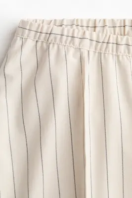 MAMA Pantalon large avec plis Before & After - Crème/rayé — photo 3