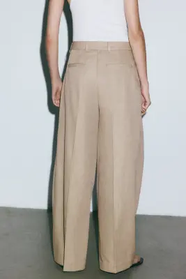 Pantalon chic avec détails croisés - Beige — photo 4