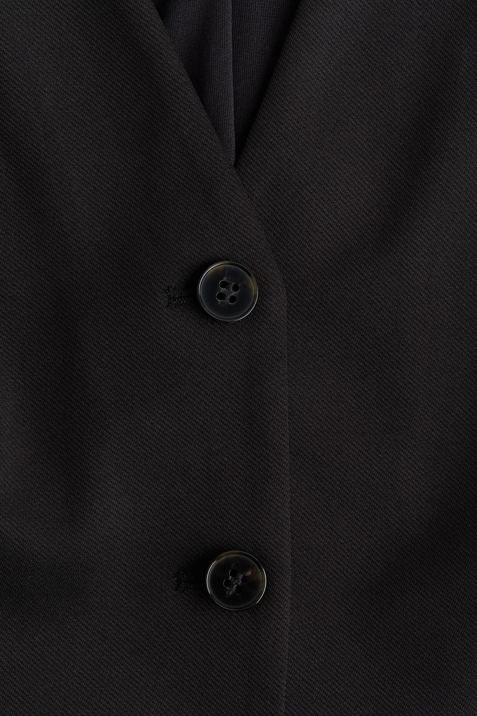 Gilet sans manches avec basque - Noir