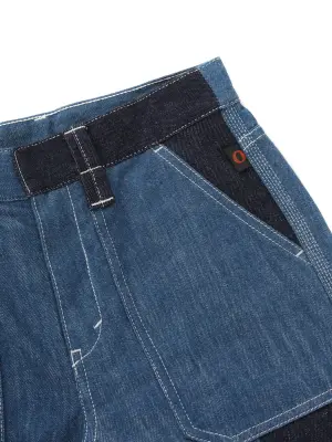 Short bermuda en jean bleu brut et empiècements bleu moyen Px boutique 650€ Taille 36 — photo 2