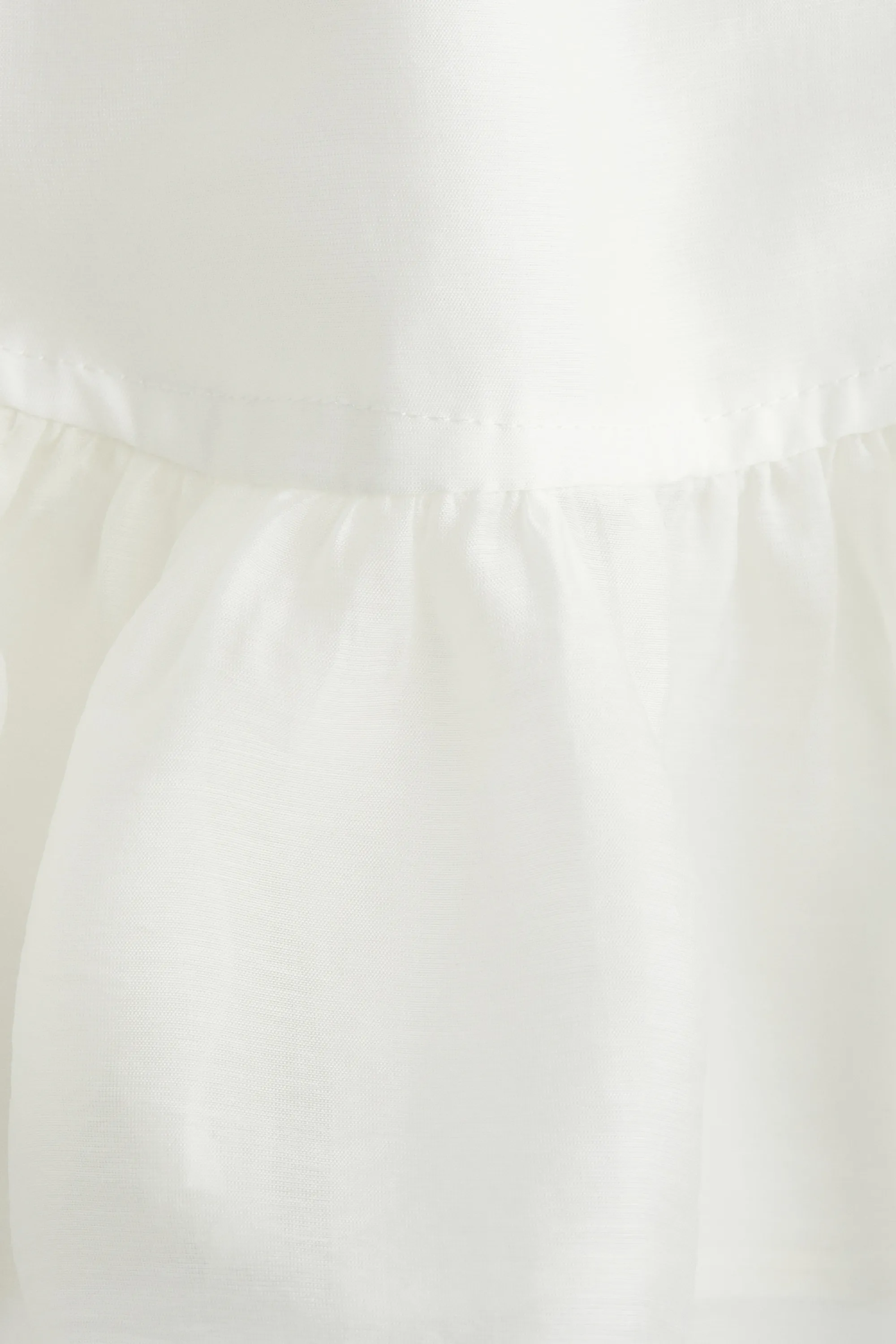 Blouse péplum avec détail à nouer - Blanc