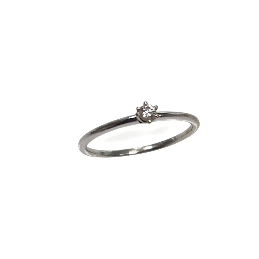 Bague blanc 1diamant environ 0.05ct