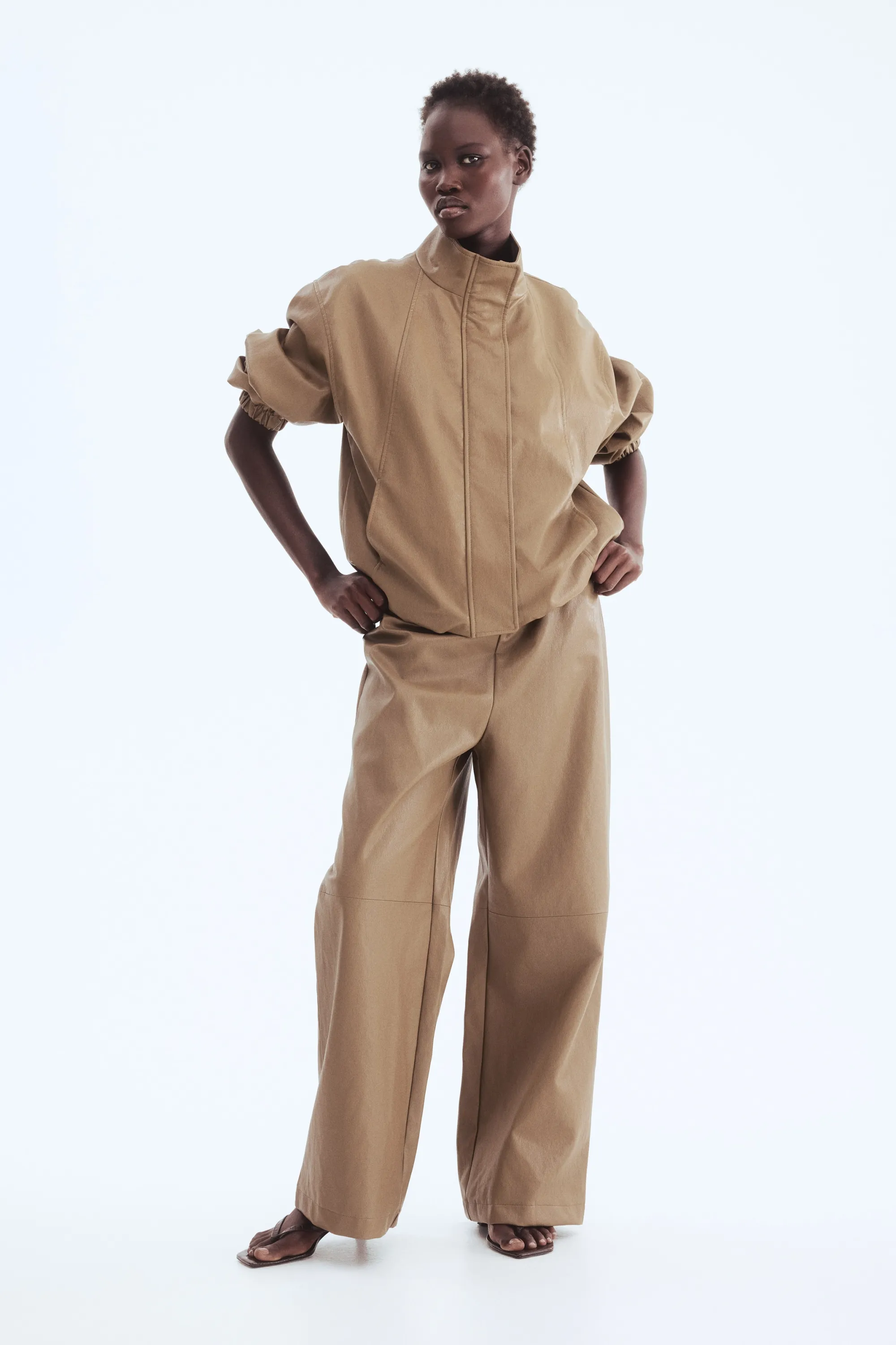 Pantalon en tissu enduit - Beige foncé
