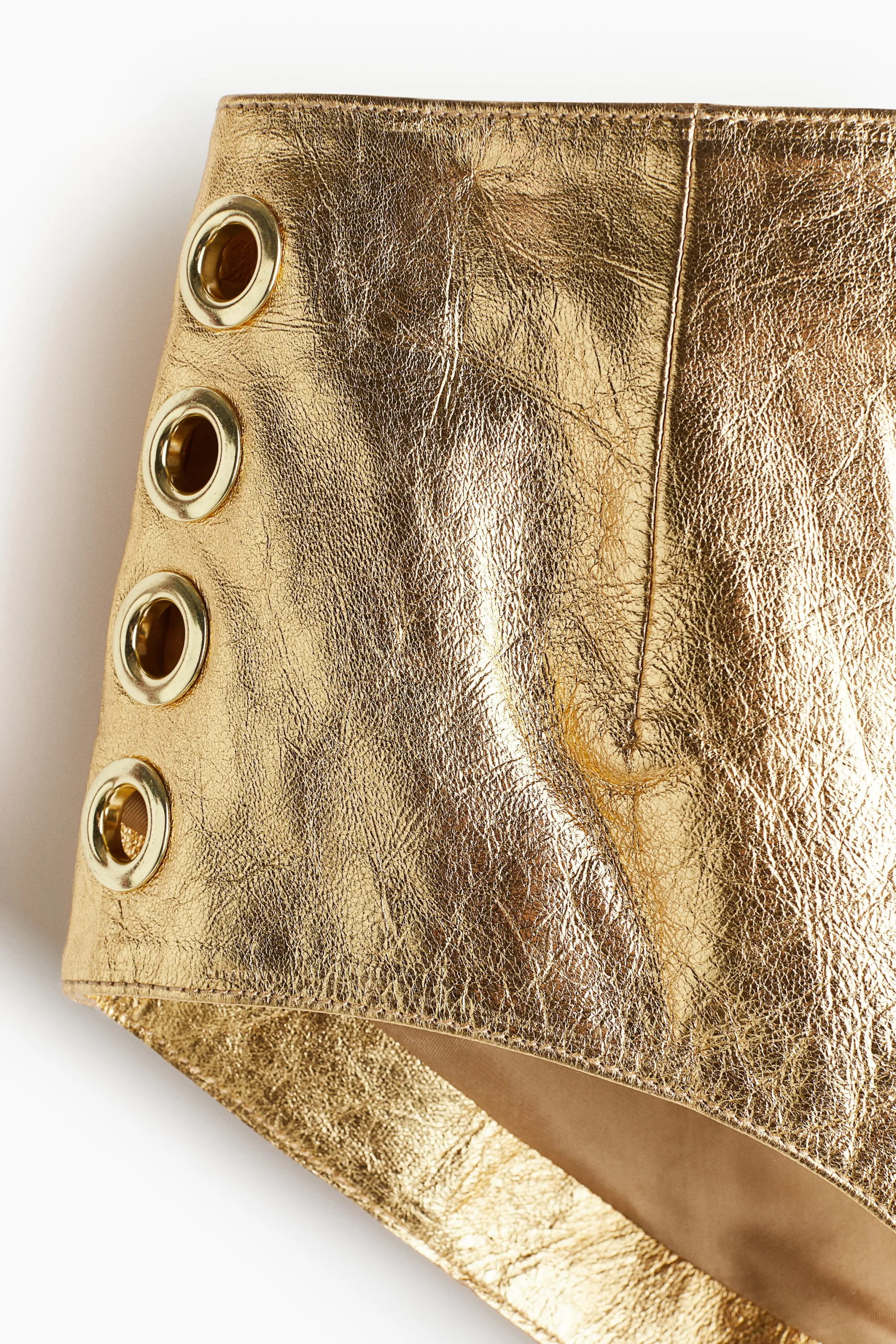 Mini short en cuir avec œillets - Doré