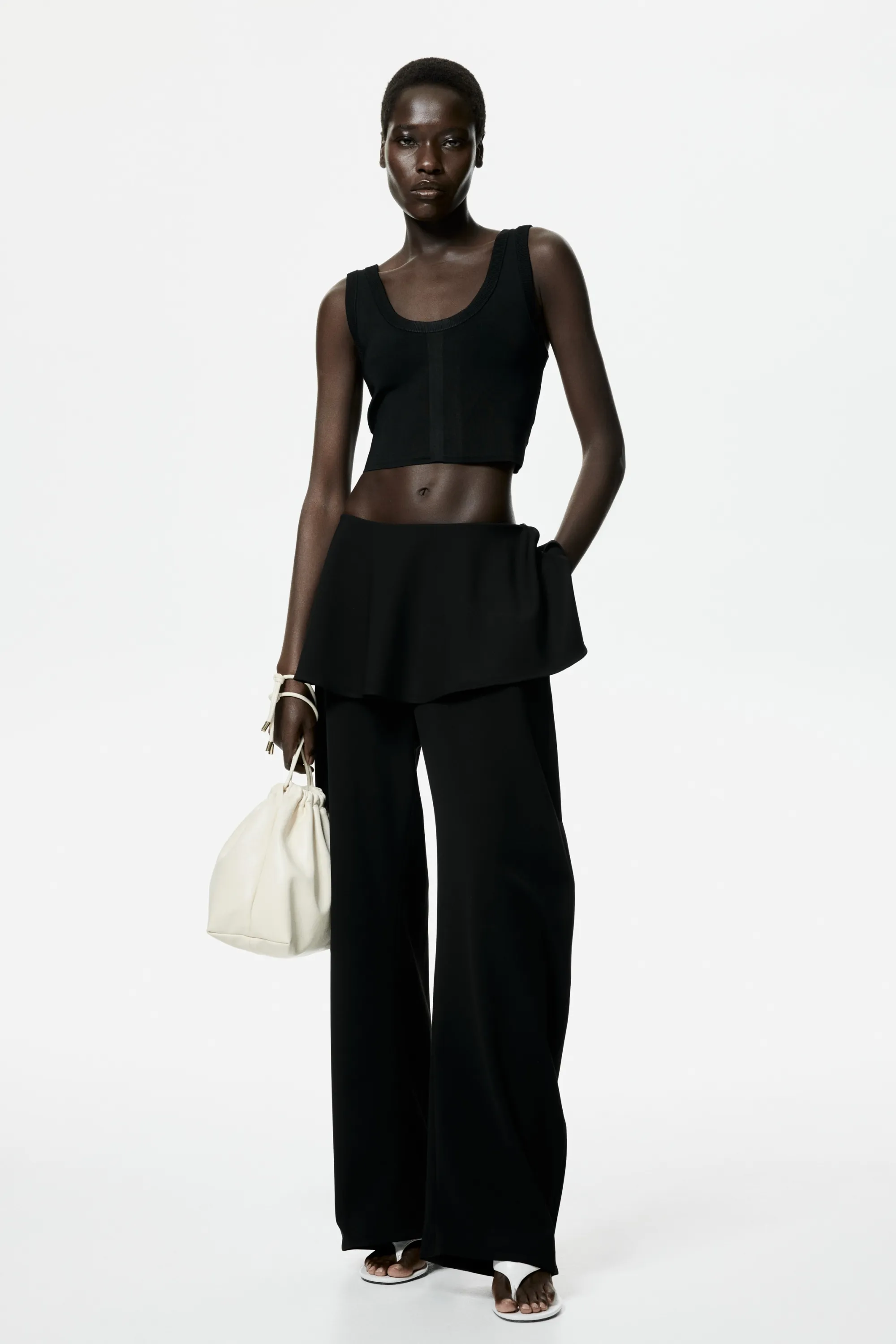 Pantalon à jambes barrel avec jupe superposée - Noir