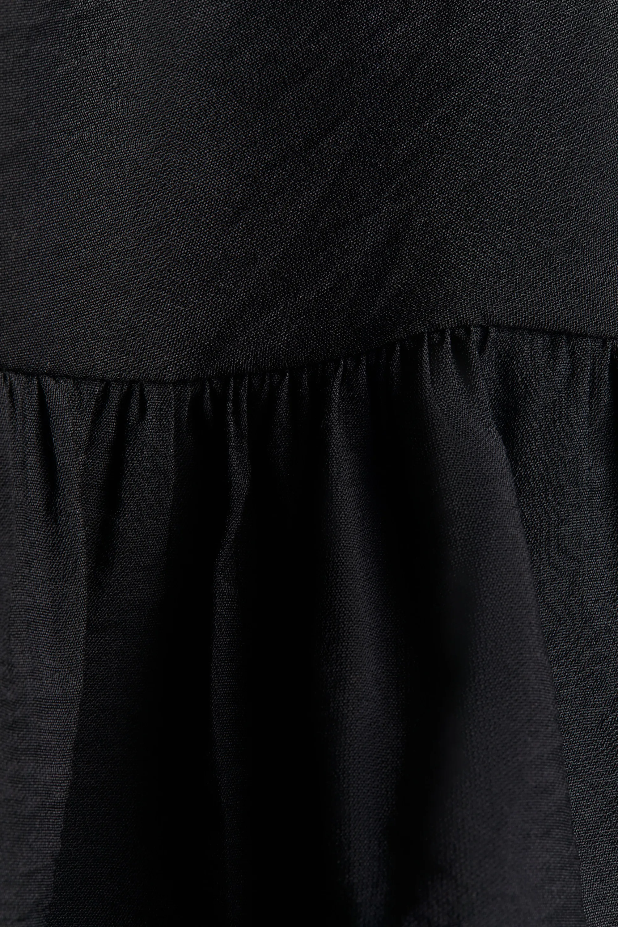 Robe sans manches volantée - Noir