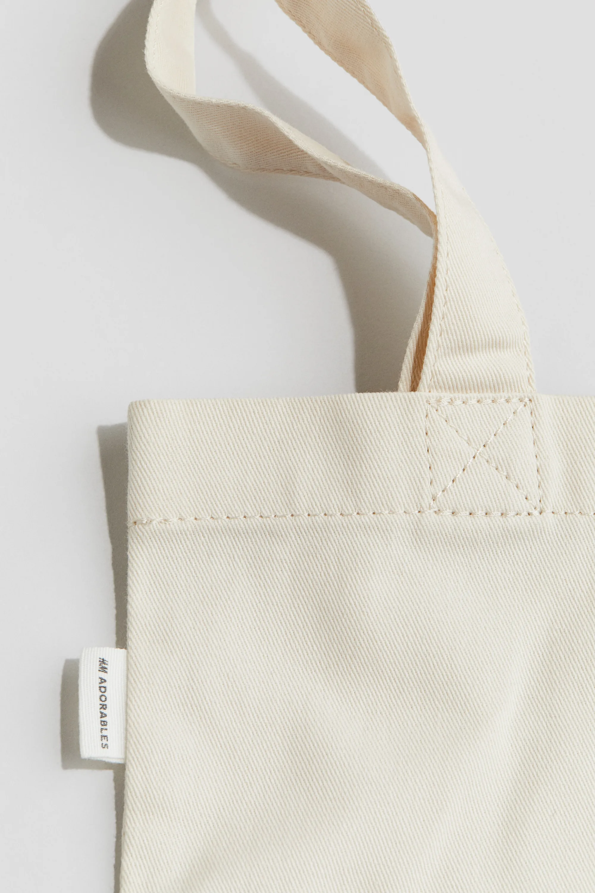 Tote bag en coton avec motif imprimé - Beige clair