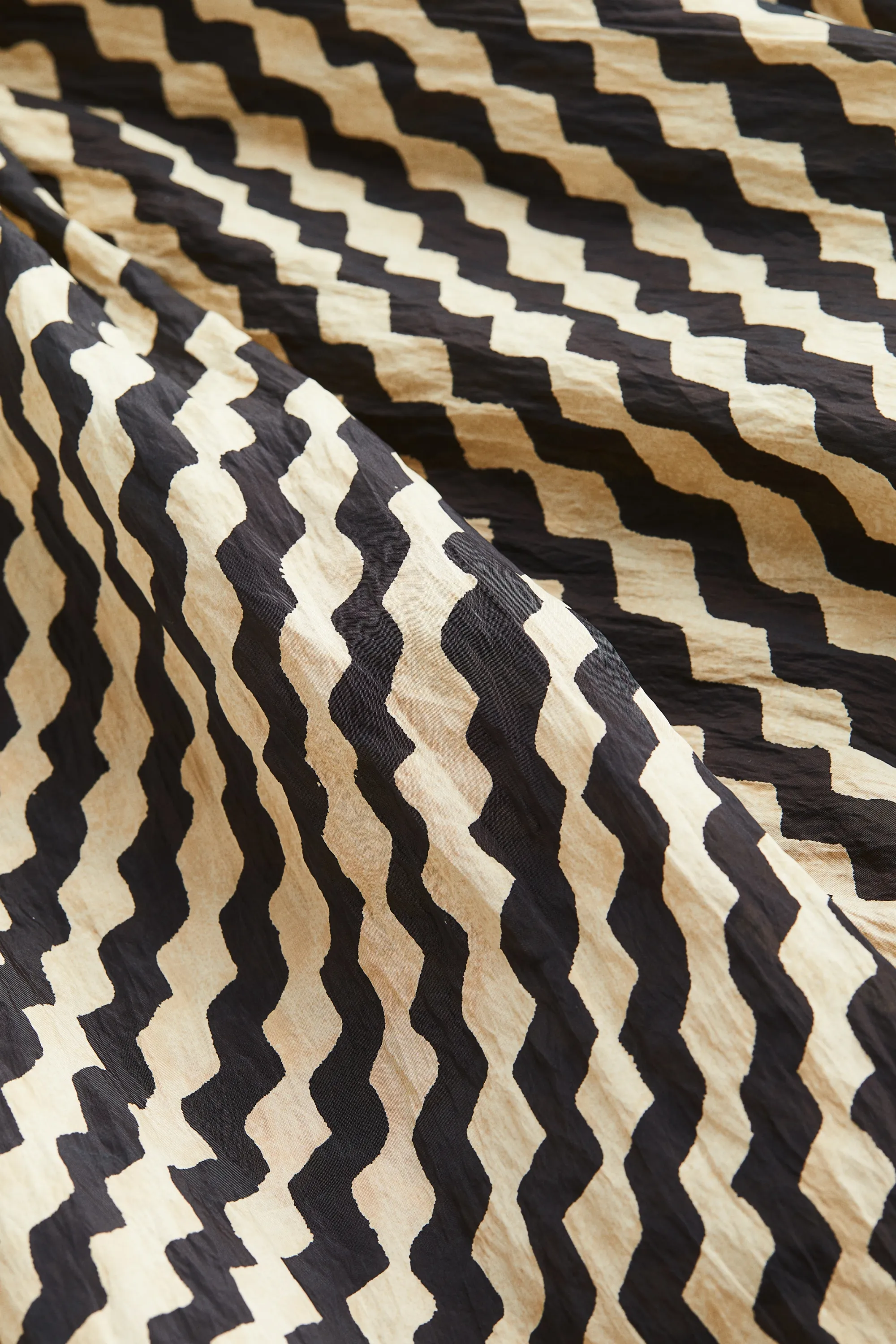 Robe en tissu texturé avec détail noué - Noir/motif