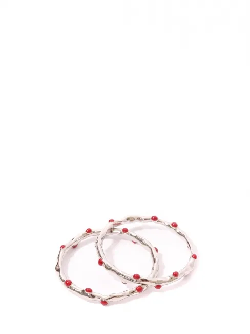 Deux bracelets joncs argent et pierre rouge Prix boutique 450€
