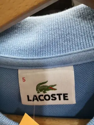 Polo Lacoste bleu clair — photo 3