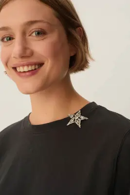 Broche Norley — photo 1