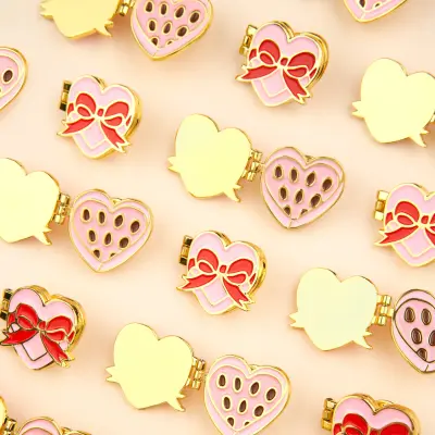 Pin's Boîte de chocolat Coucou Suzette — photo 1