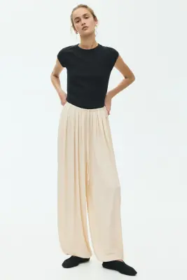 Pantalon à cordon avec jambes ballon - Beige clair — photo 1