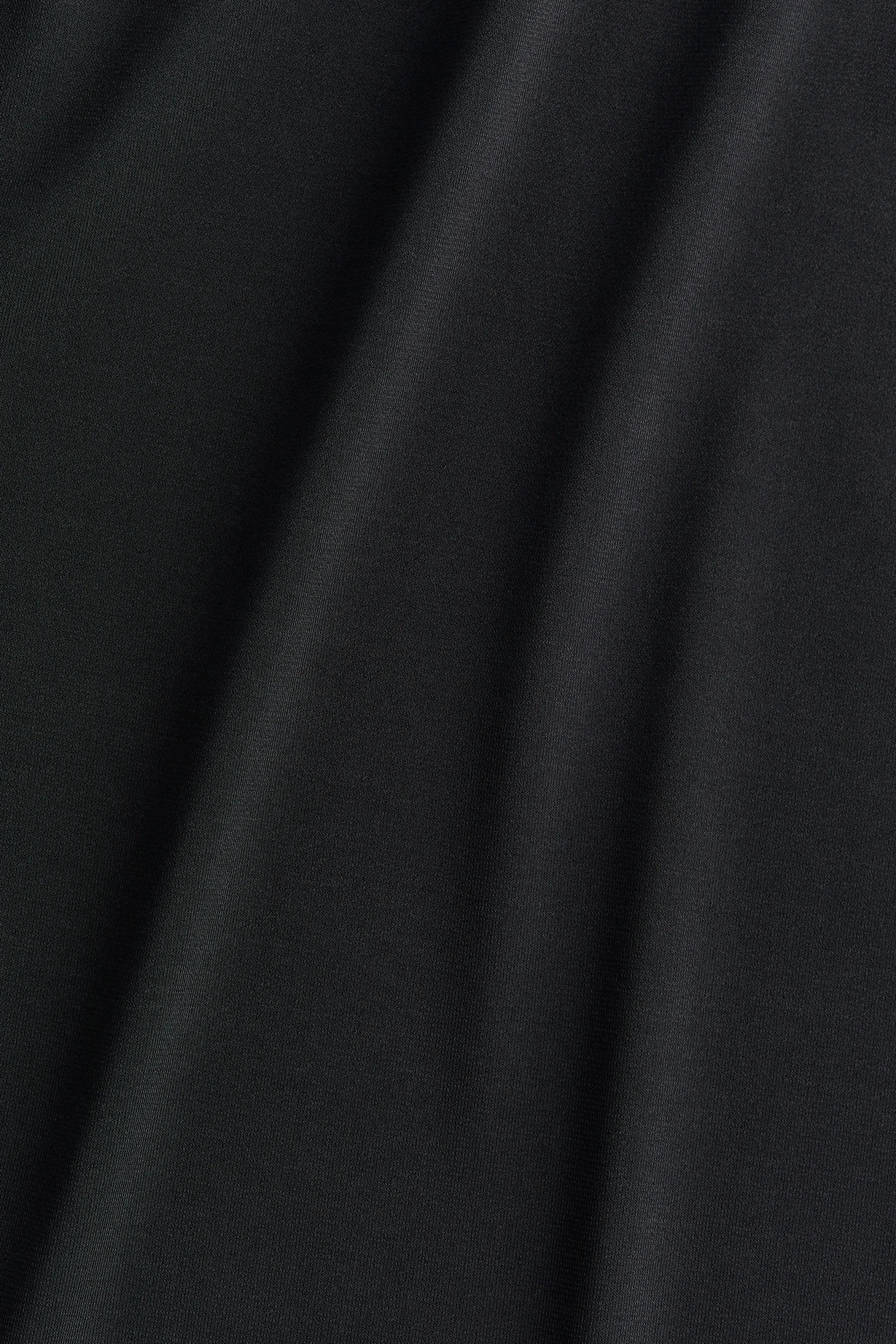 Top en microfibre avec col cheminée - Noir