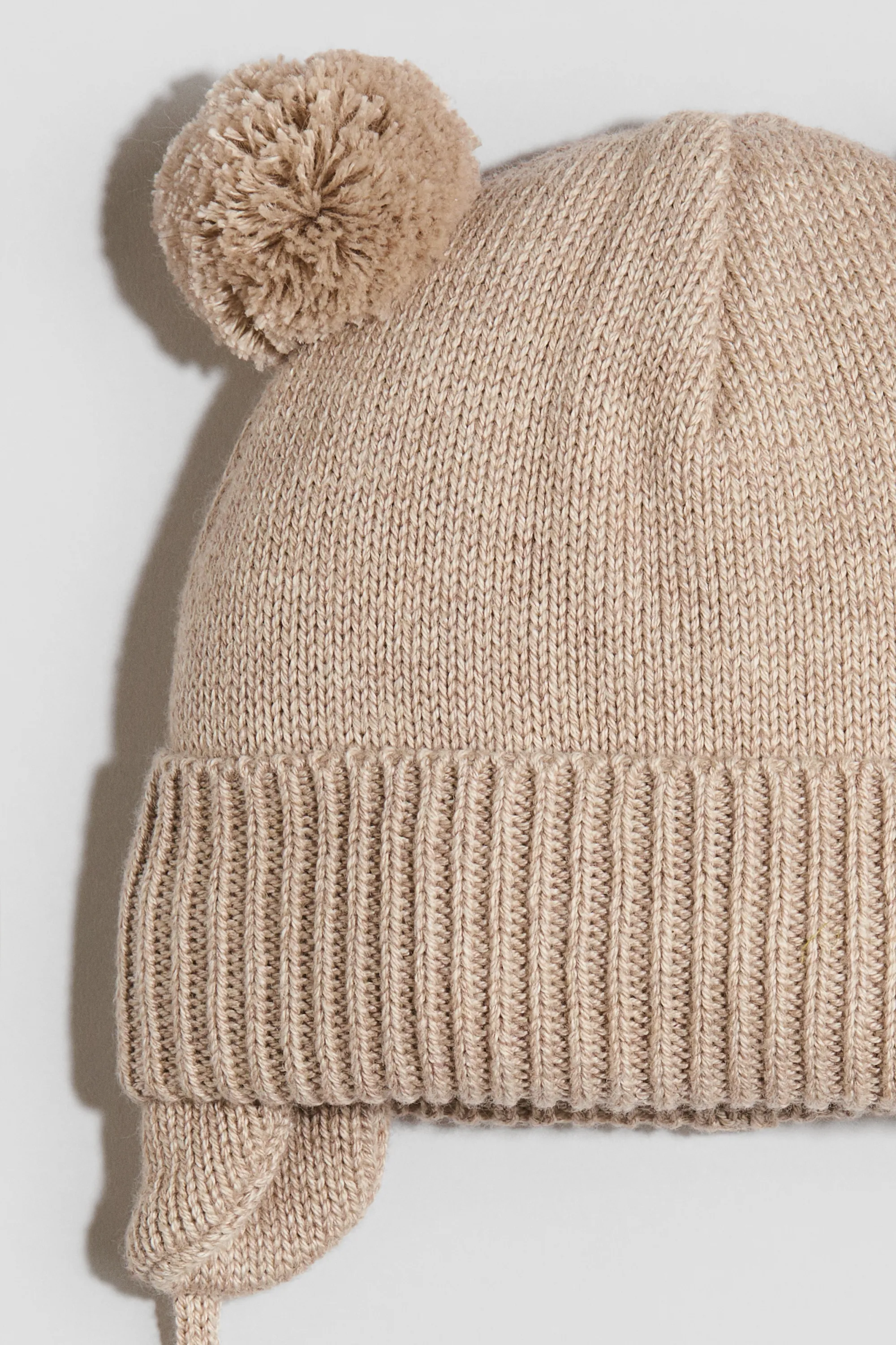 Bonnet doublé polaire avec liens à nouer - Beige