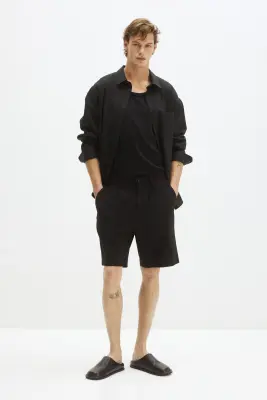 Short Four-way Stretch Loose Fit - Noir — photo 1
