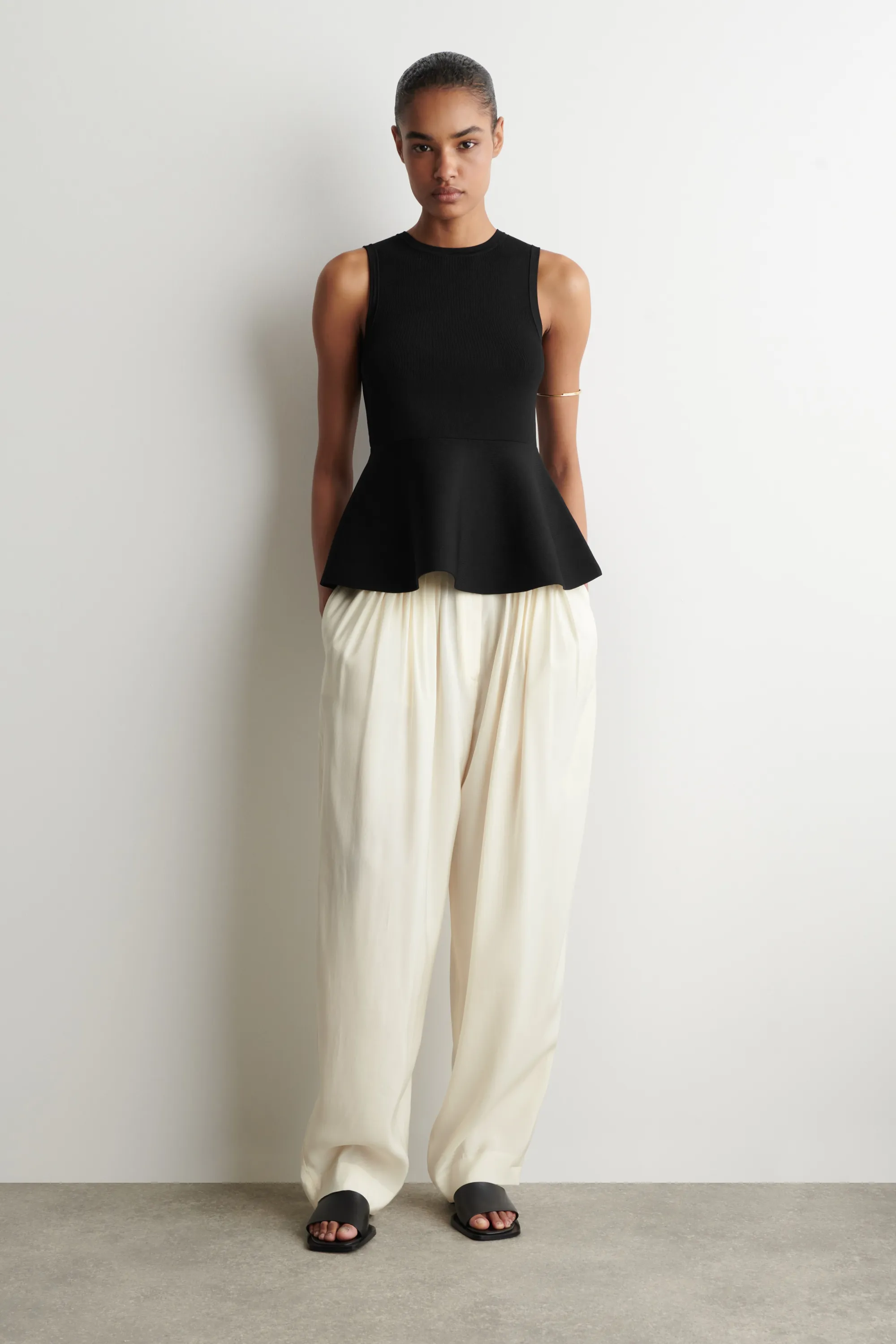 TOP PÉPLUM EN MAILLE - NOIR