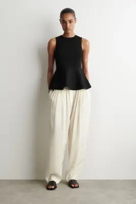 TOP PÉPLUM EN MAILLE - NOIR — photo 1
