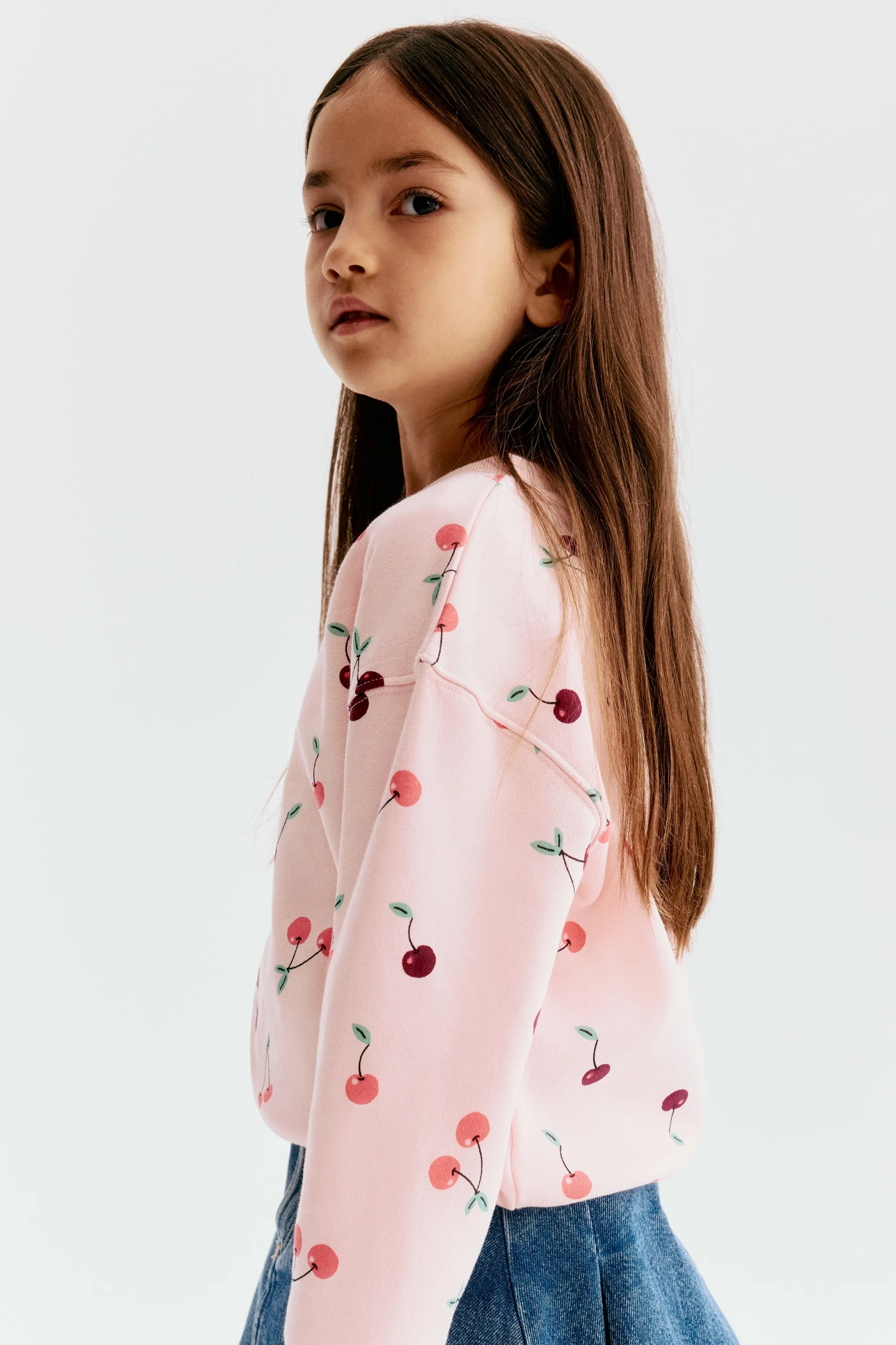 Sweat à motif imprimé avec intérieur brossé - Rose clair/cerises