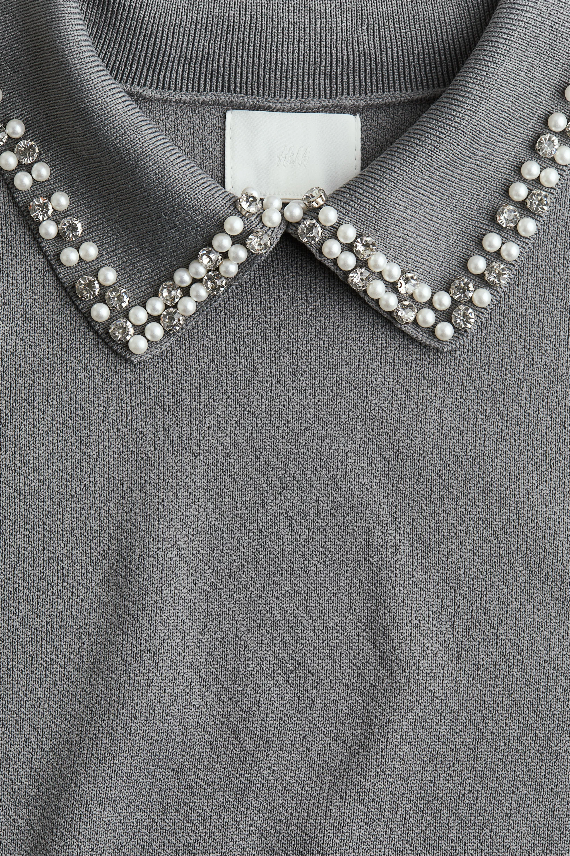 Top en maille avec col ornementé - Gris