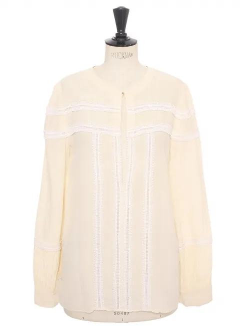 Blouse manches longues en soie beige et broderie dentelle blanche Prix boutique 1100€ Taille 36/38