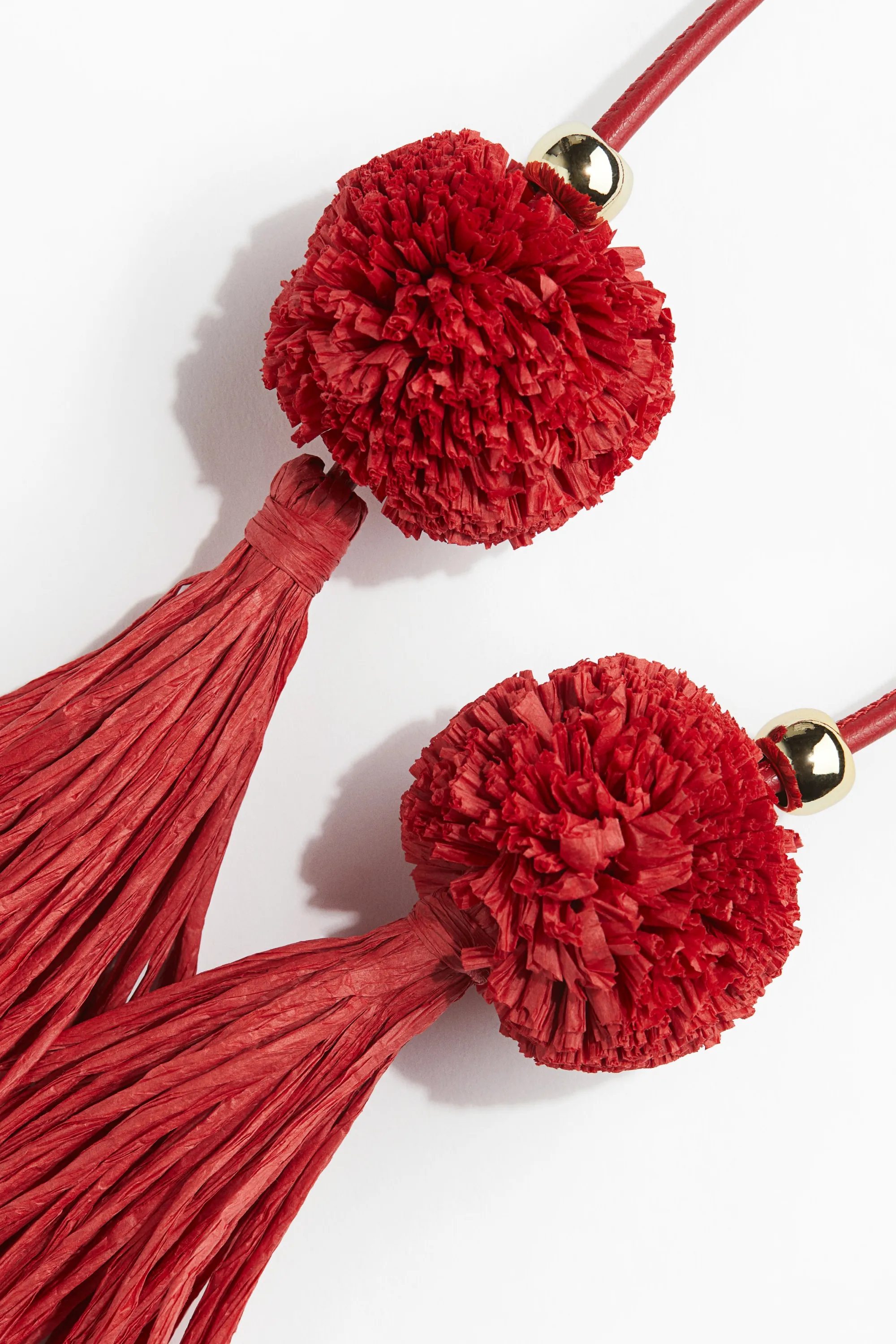 Bijou de sac avec glands en paille - Rouge
