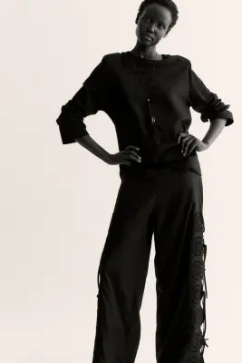 Pantalon avec détails à nouer et broderie anglaise - Noir — photo 1