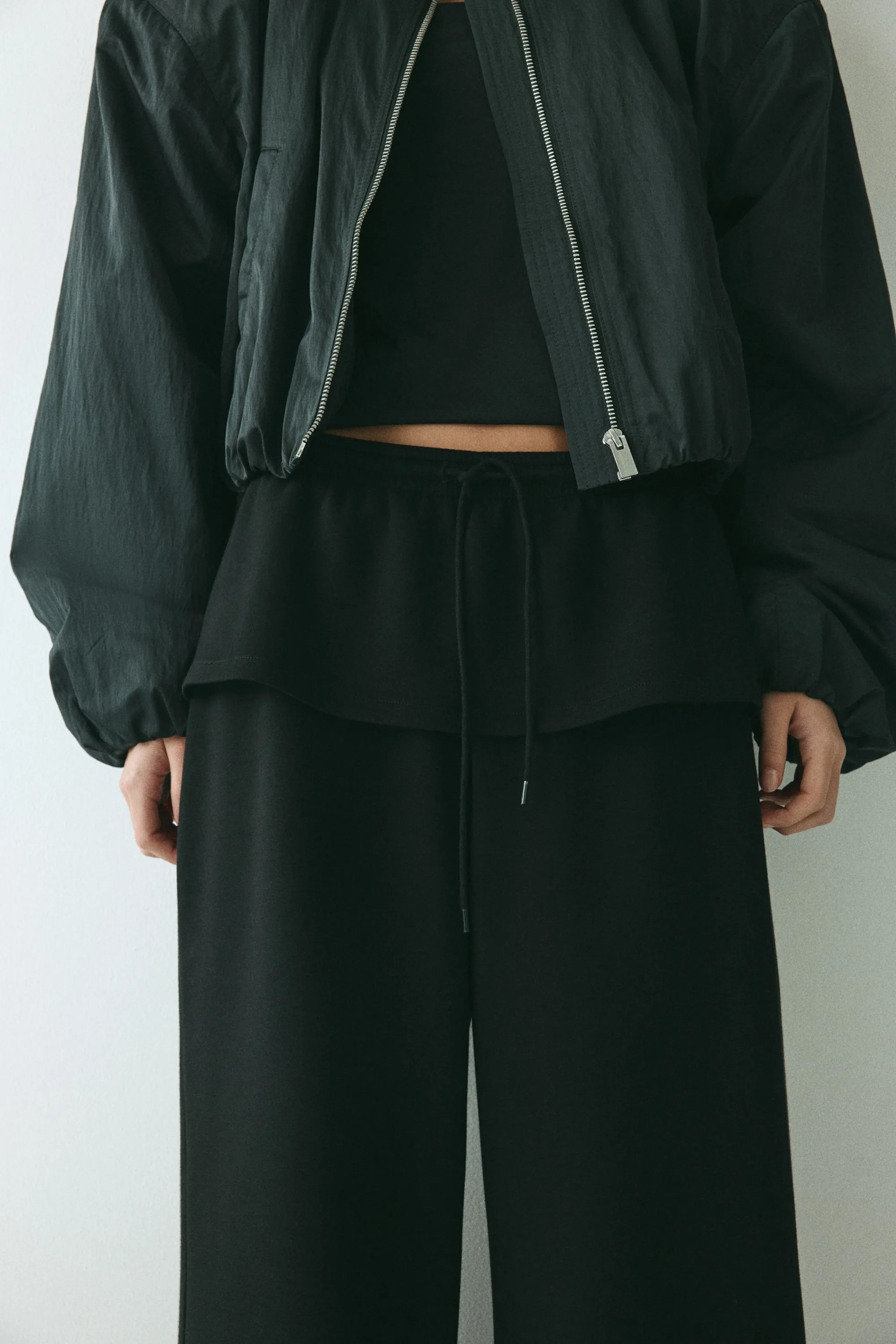 Pantalon en scuba avec jupe superposée - Noir
