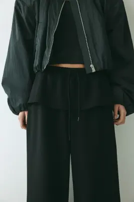 Pantalon en scuba avec jupe superposée - Noir — photo 1
