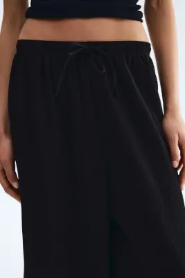 Pantalon large avec taille élastique - Noir — photo 1