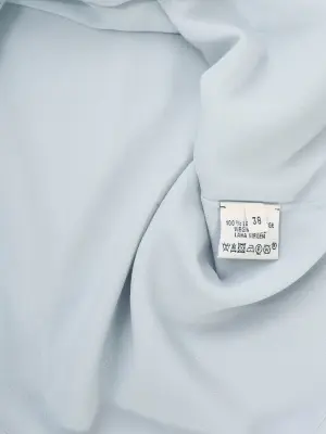 T-shirt manches courtes col rond en laine bleu clair Prix boutique 1000€ Taille 36/38 — photo 3