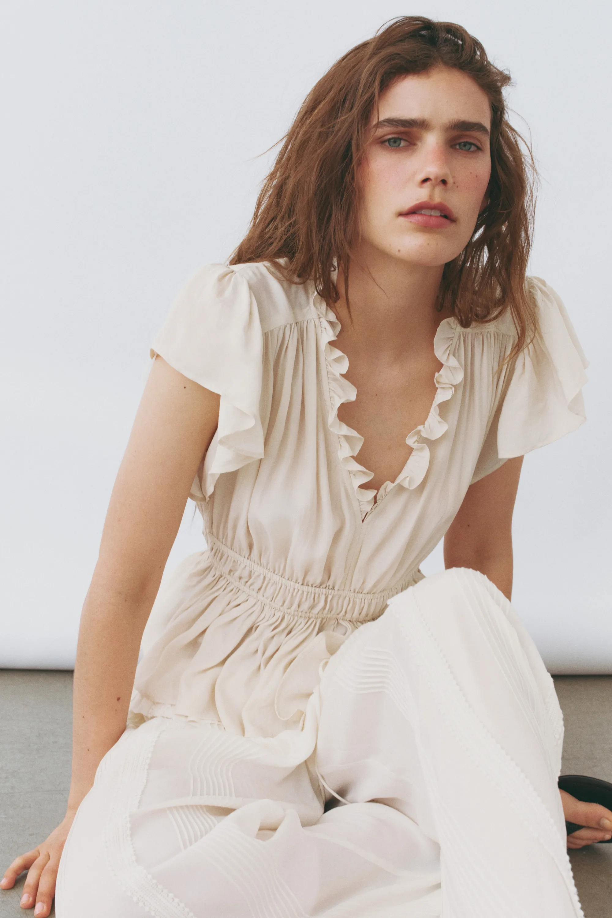 Blouse à manches volantées avec basque - Beige clair
