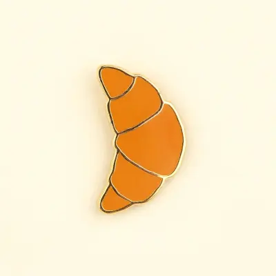 Pin's Croissant Coucou Suzette — photo 1