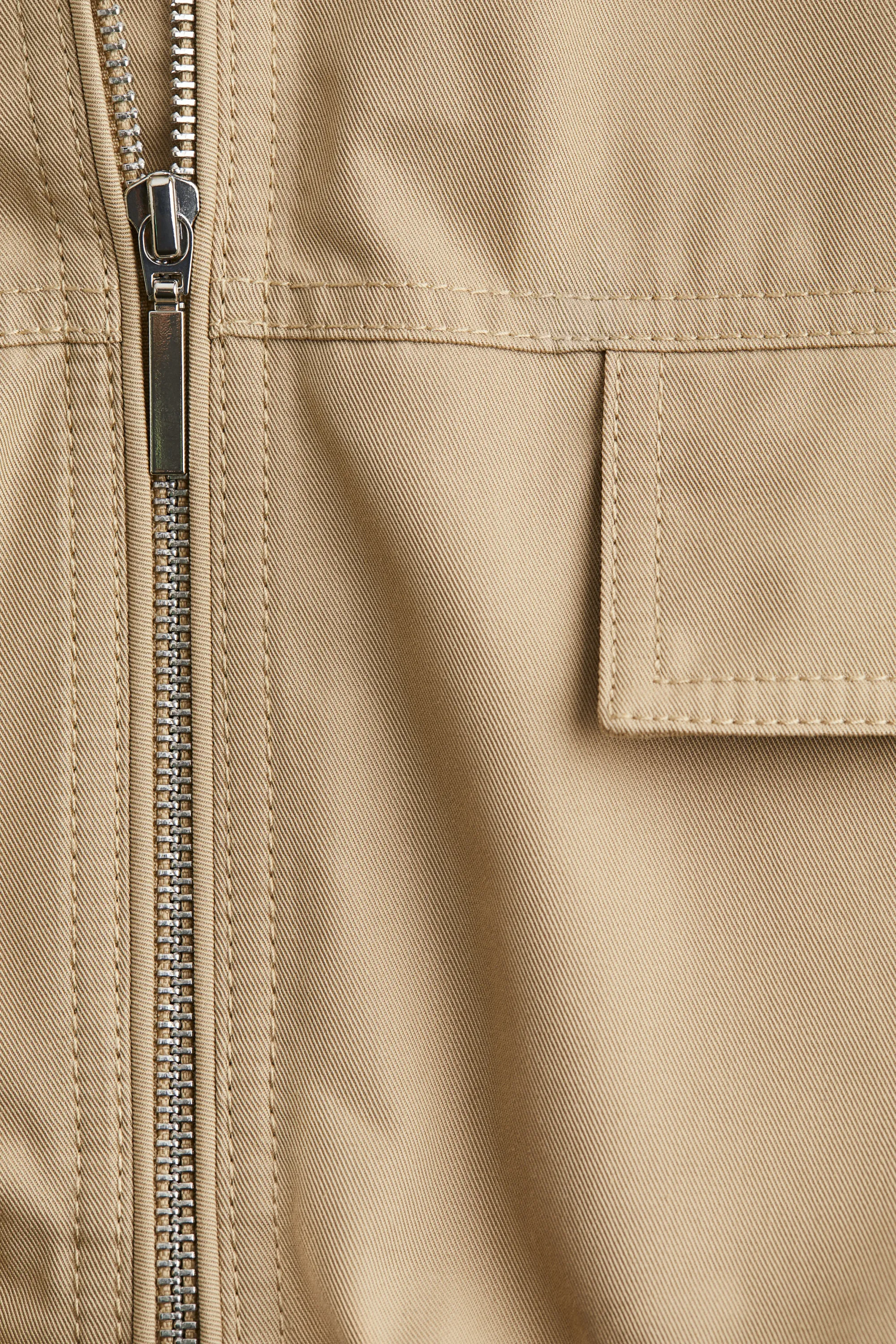 Veste sans manches à effet boule - Beige