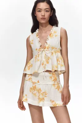 Mini short à taille smockée - Crème/fleuri — photo 1