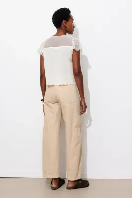 Pantalon large à oeillets — photo 4